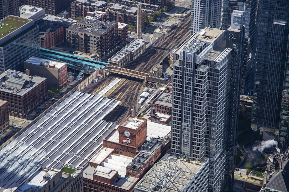 an aerial view of a city with tall buildings