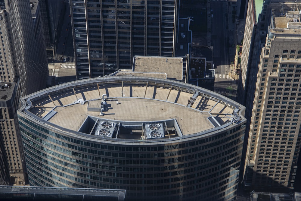 an aerial view of a circular building in a city