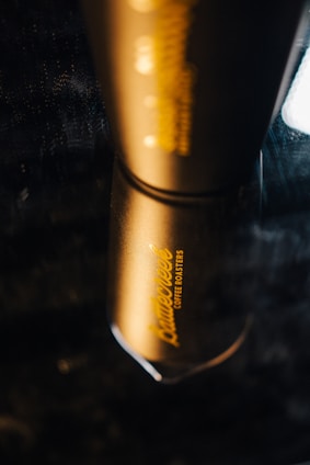 A sturdy travel tumbler with a matte finish, perfect for on-the-go coffee