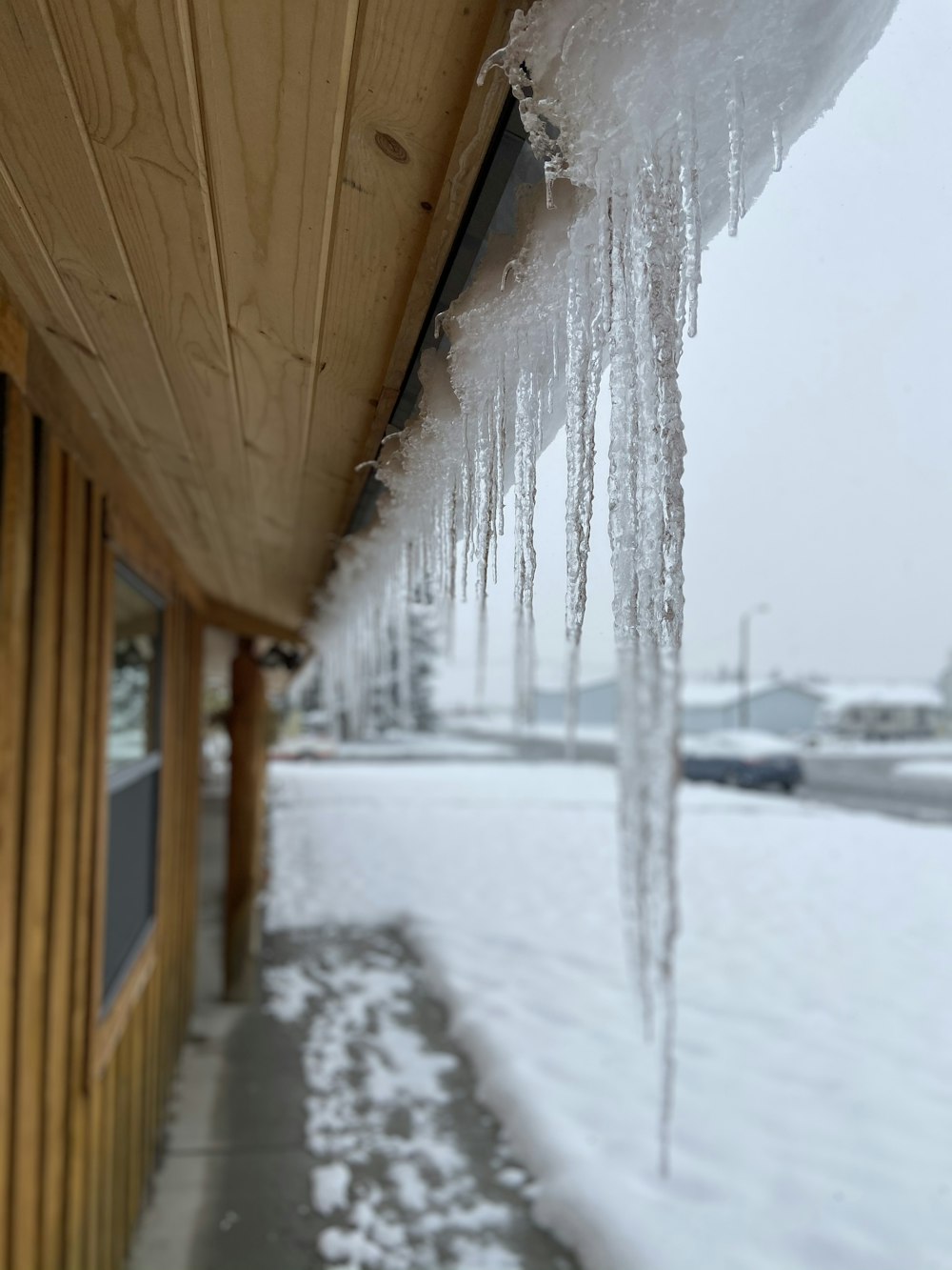 icicles hanging from the roof of a building