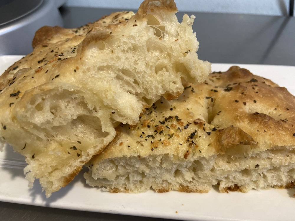 a close up of a piece of bread on a plate