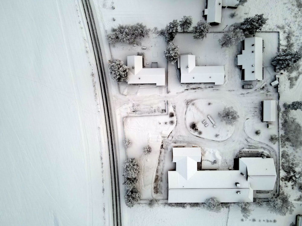 an aerial view of a snow covered area