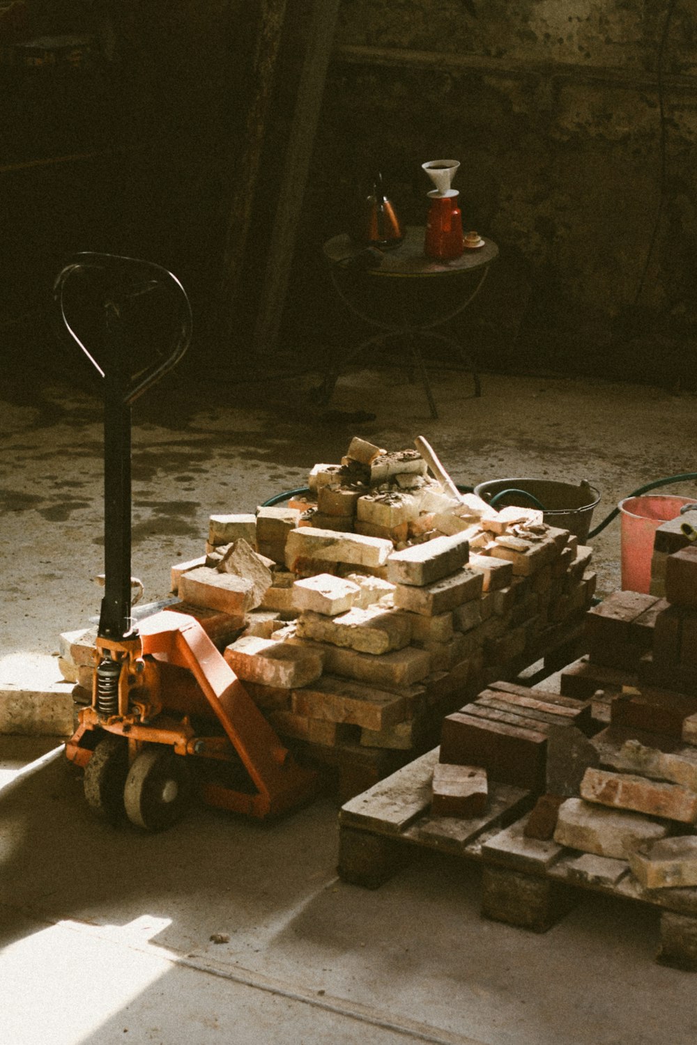 a pile of bricks sitting next to a fork