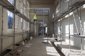 a room with scaffolding and scaffolding on the walls
