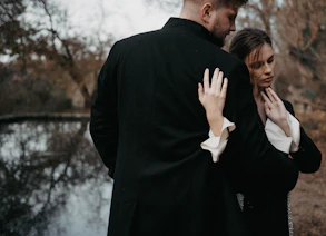 a man and a woman standing next to each other