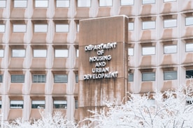 a building with a sign that says department of housing and urban development
