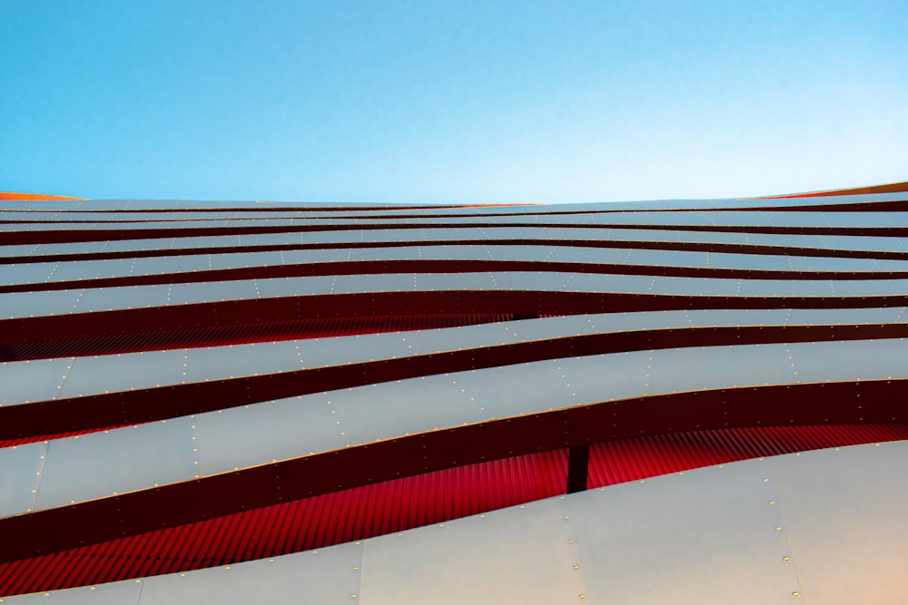 a building that has red and white stripes on it