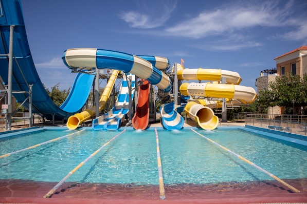 a water park with a water slide and slides
