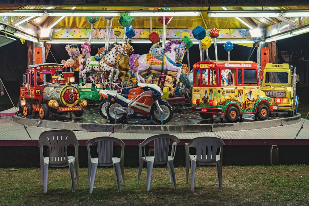 a carnival ride with a bunch of toys on top of it