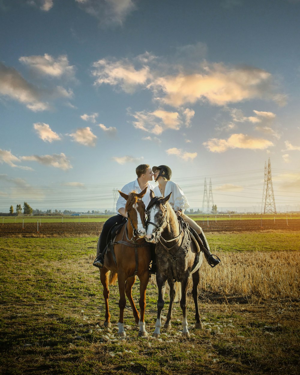 a couple of people riding on the back of horses