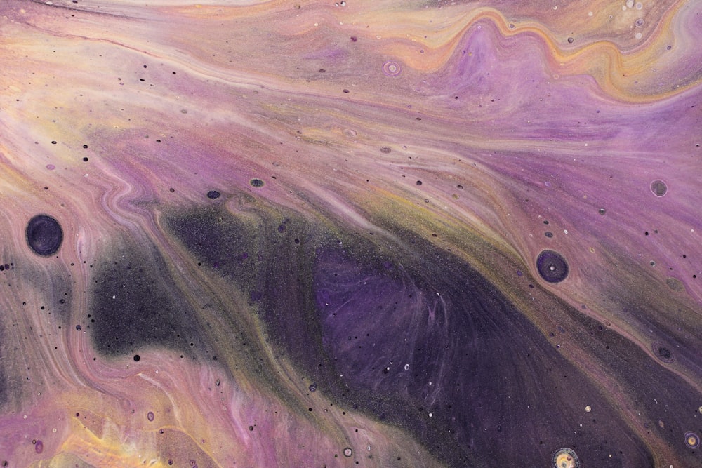 a painting of purple, yellow and black colors