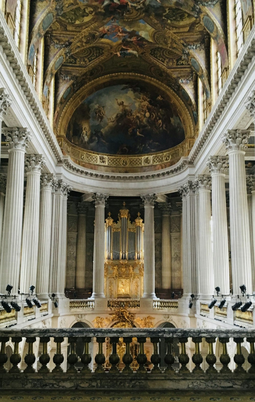 a large cathedral with a painting on the ceiling