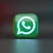 a green square button with a phone on it