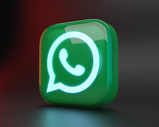 a green square button with a green whatsapp icon