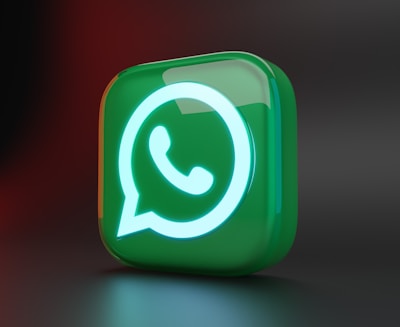 a green square button with a green whatsapp icon