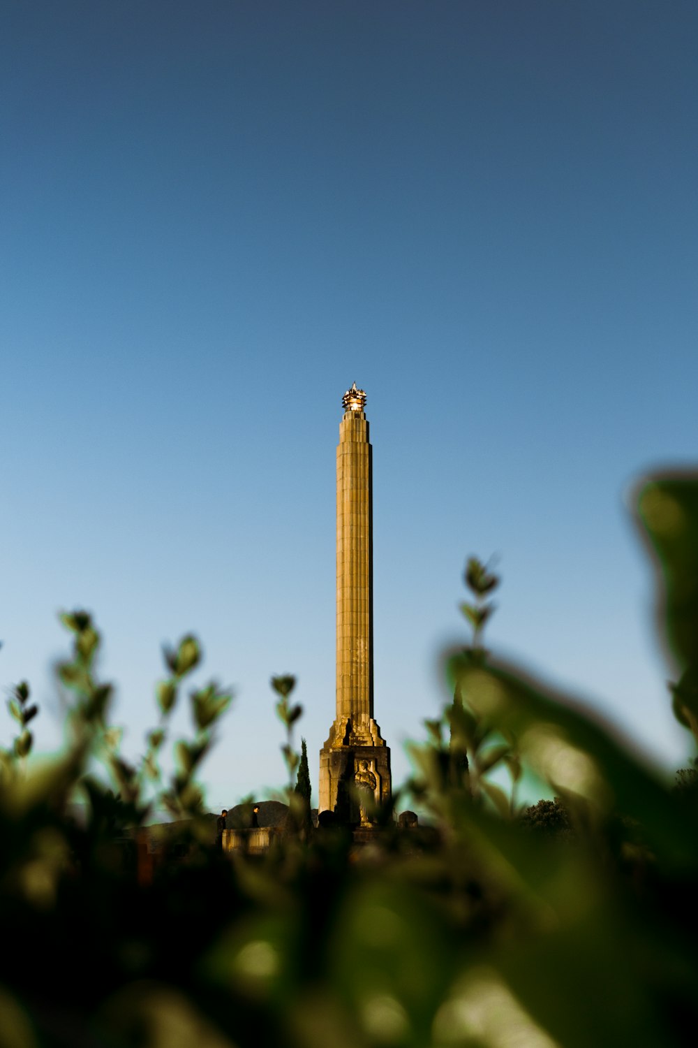 a tall tower with a clock on top of it