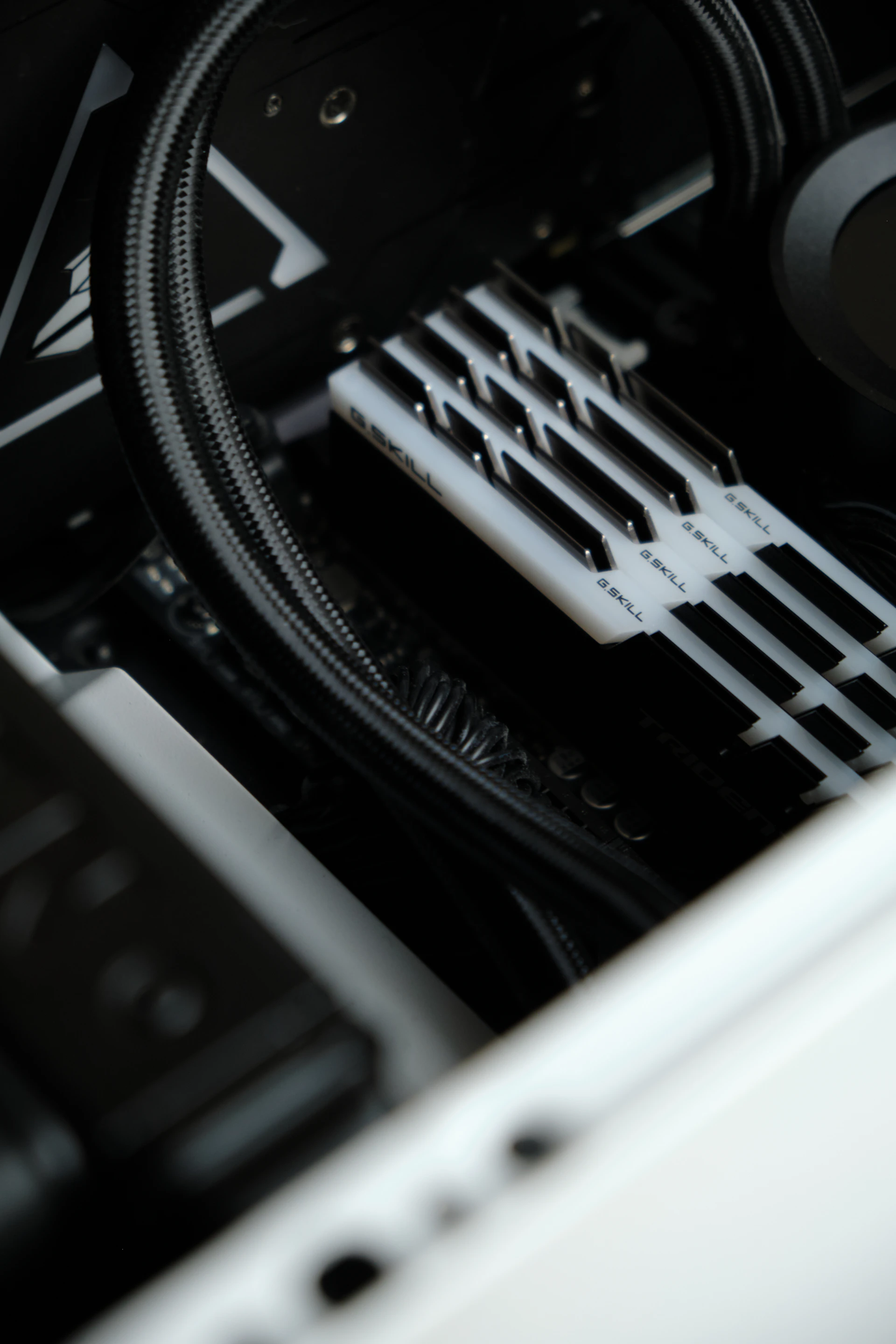 the inside of a computer case with wires and cables