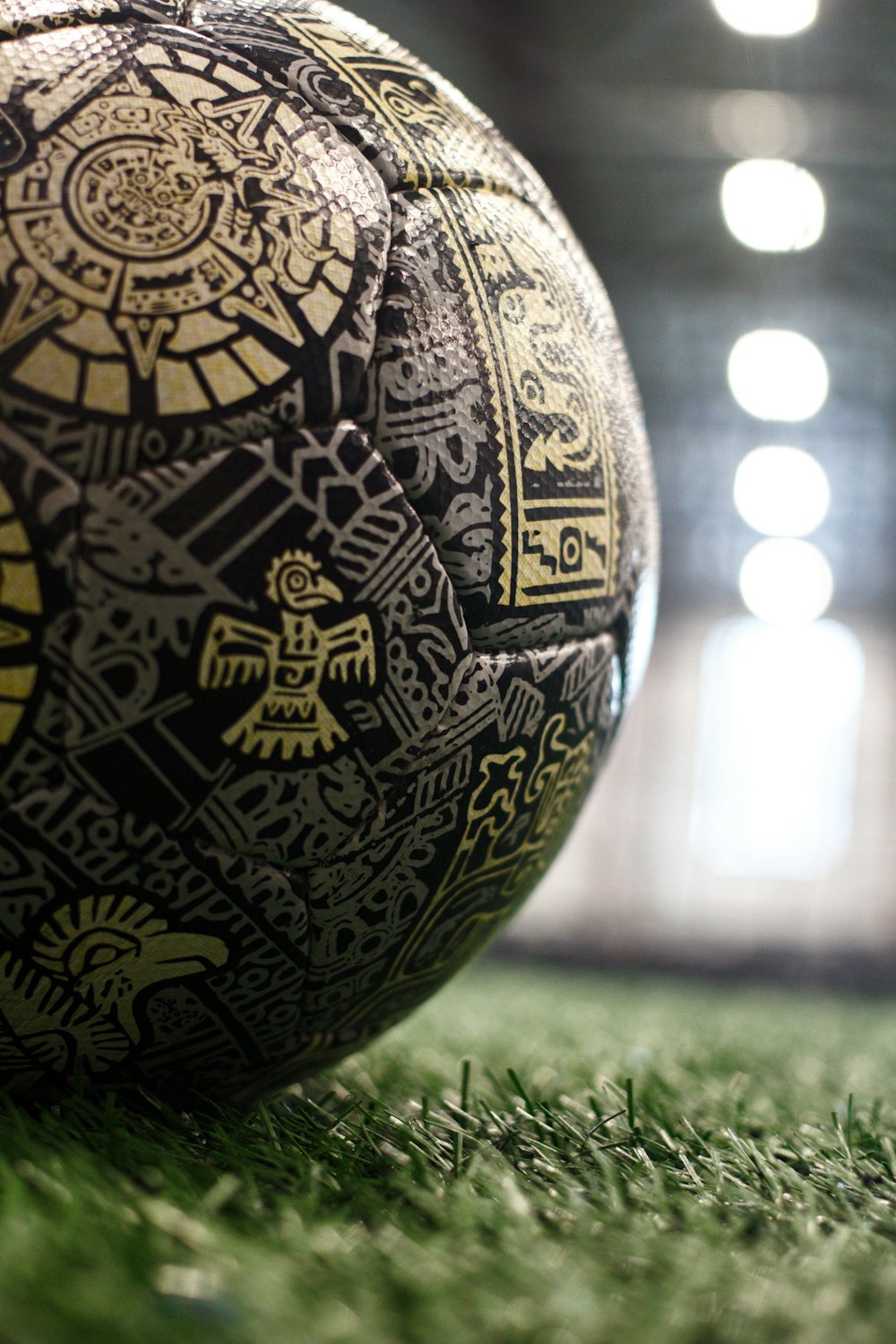 a close up of a soccer ball on a field