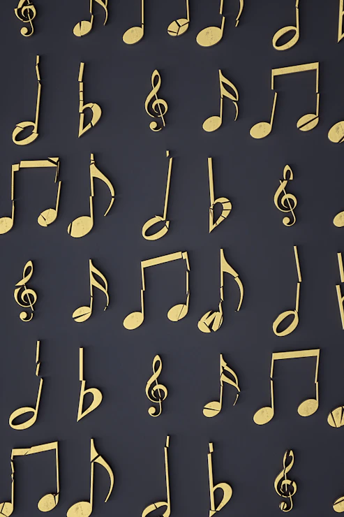 Gold musical notes arranged in a grid pattern on a dark grey background
