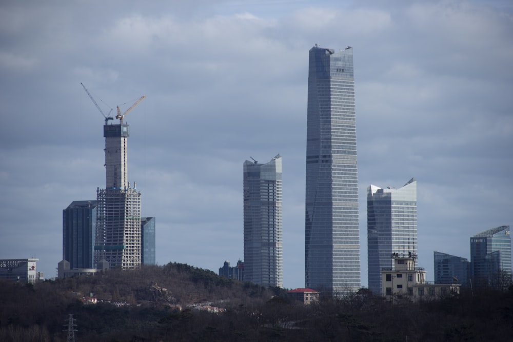 a group of tall buildings in a city