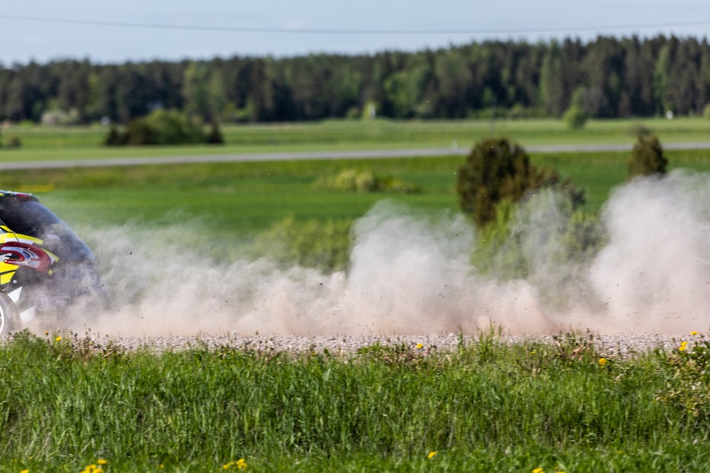 a person riding a motorcycle on a dirt road