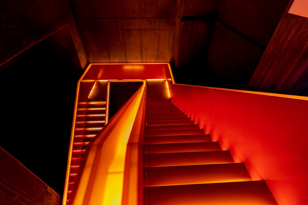 a staircase with a red light at the top of it