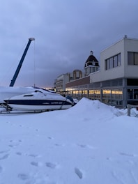 a boat that is sitting in the snow