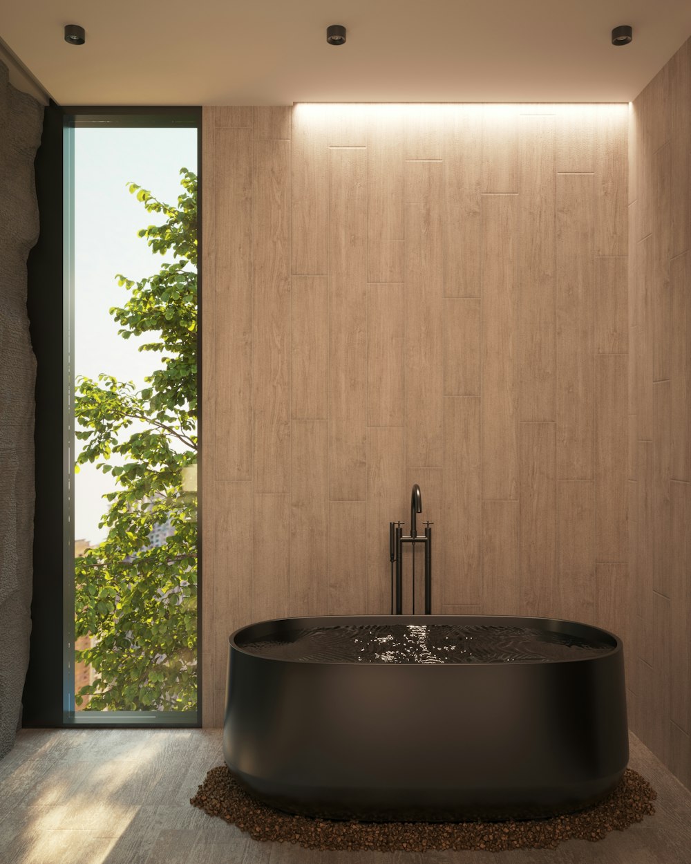 a large black bath tub sitting in a bathroom next to a window