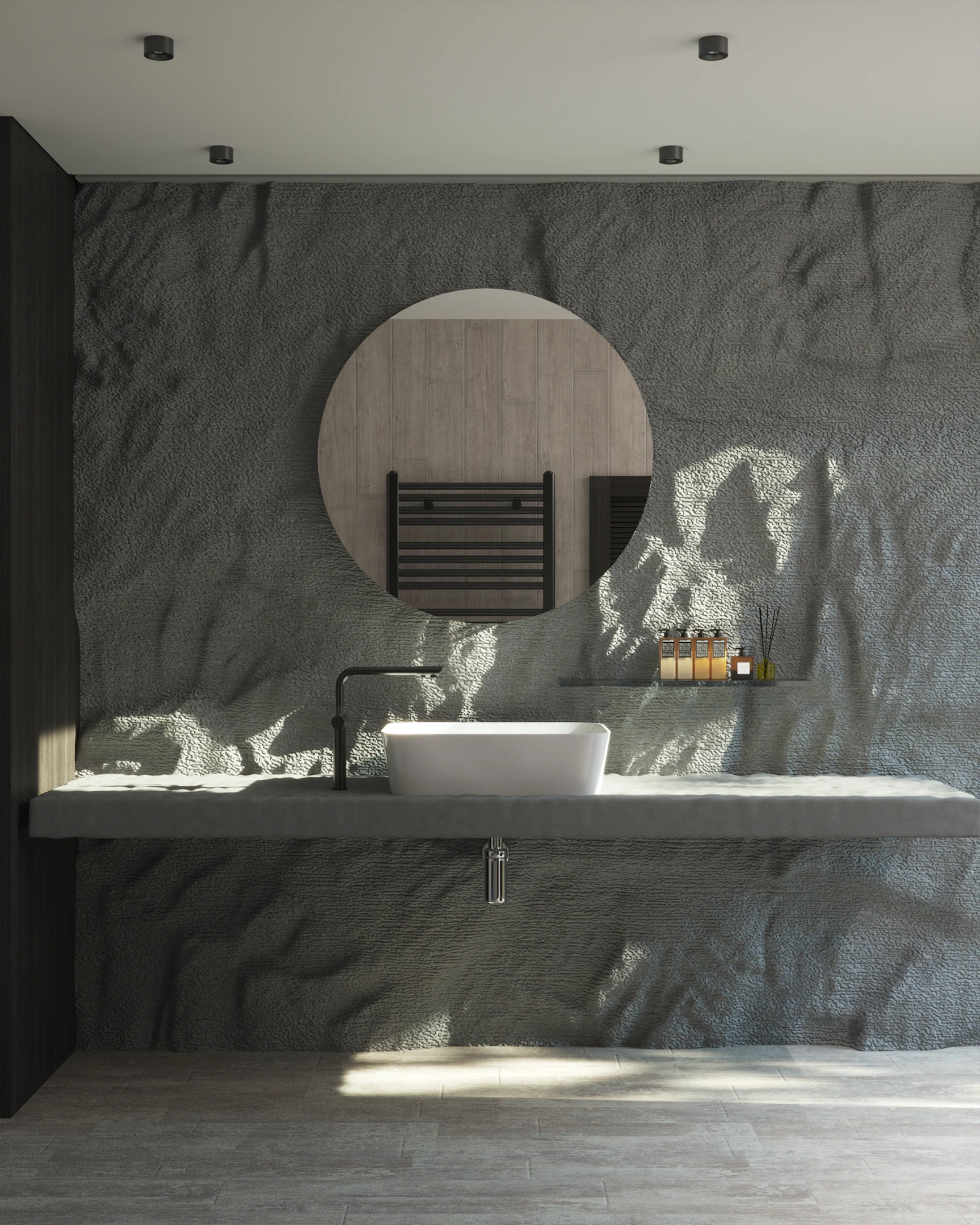 Mermer kaplı banyo, yuvarlak ayna ve taş lavabo