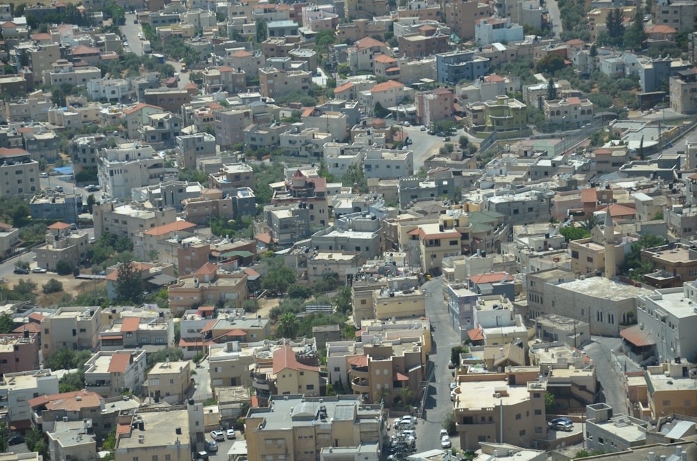 an aerial view of a city with lots of buildings