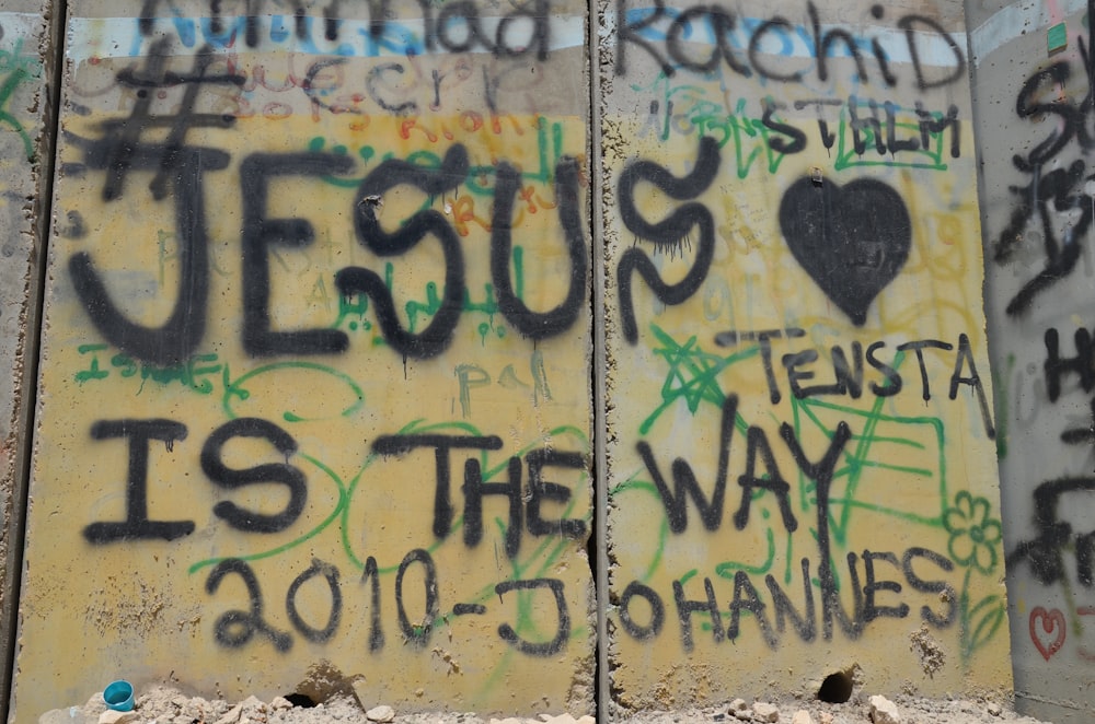 a wall with some writing on it