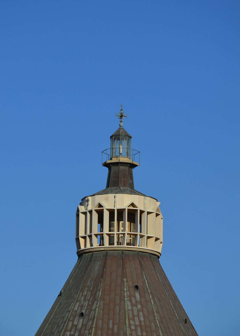 a tall tower with a clock on the top of it