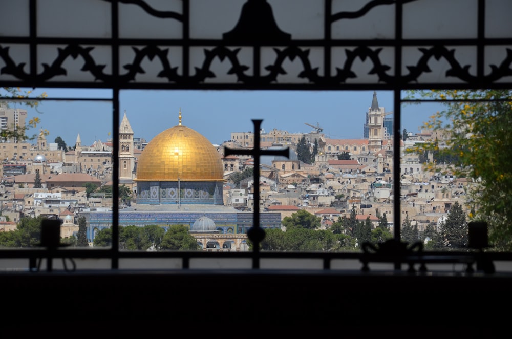 a view of the dome of the rock from a window