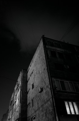 Nighttime shot of a government building with visible HVAC infrastructure, symbolizing reliability.