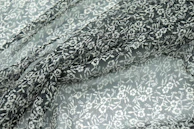 a close up of a black and white fabric