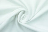 a close up view of a white fabric