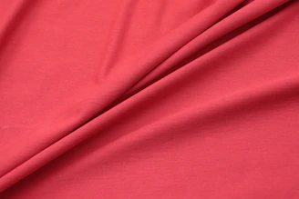 a close up view of a red fabric