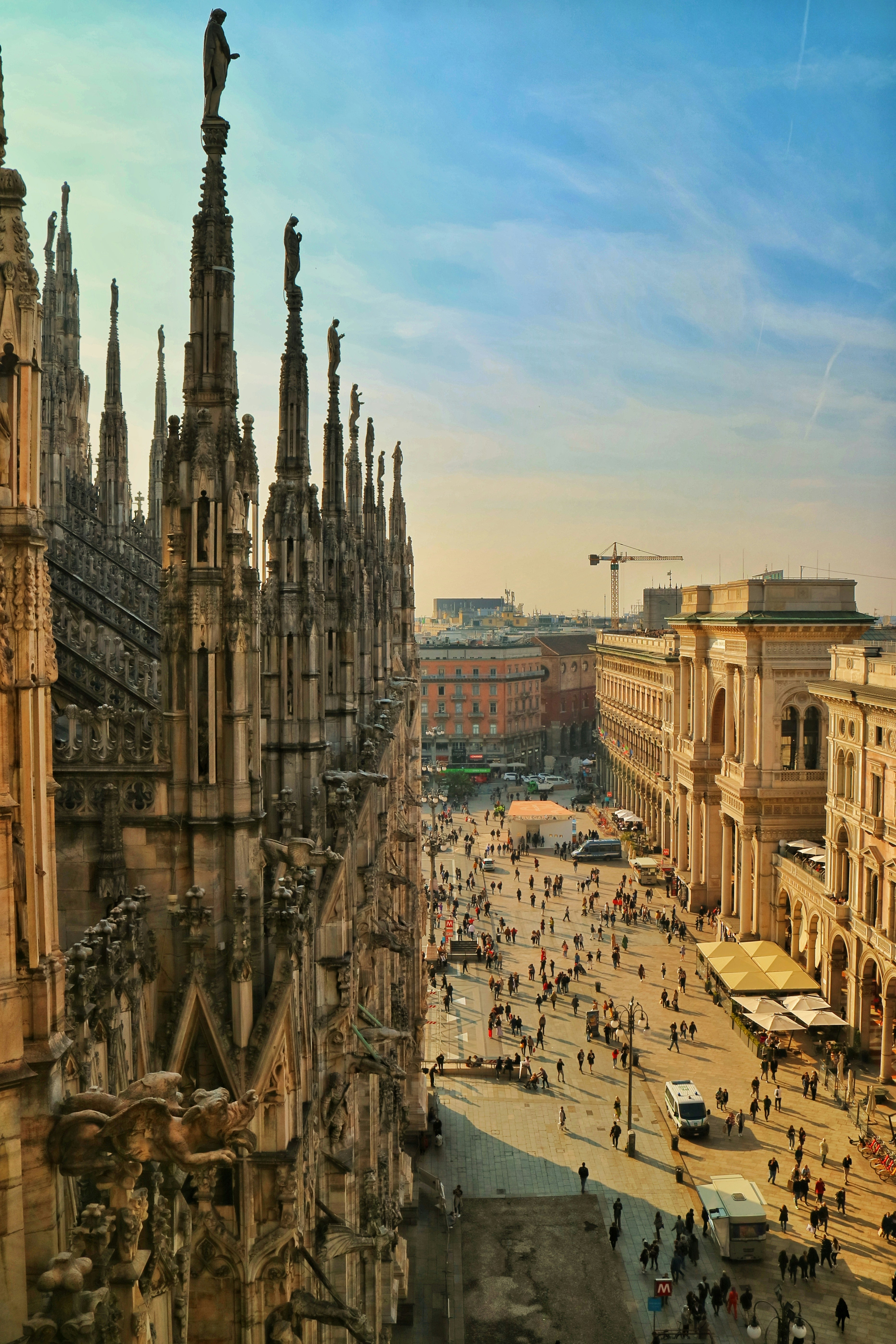 a view of a city with a lot of people walking around