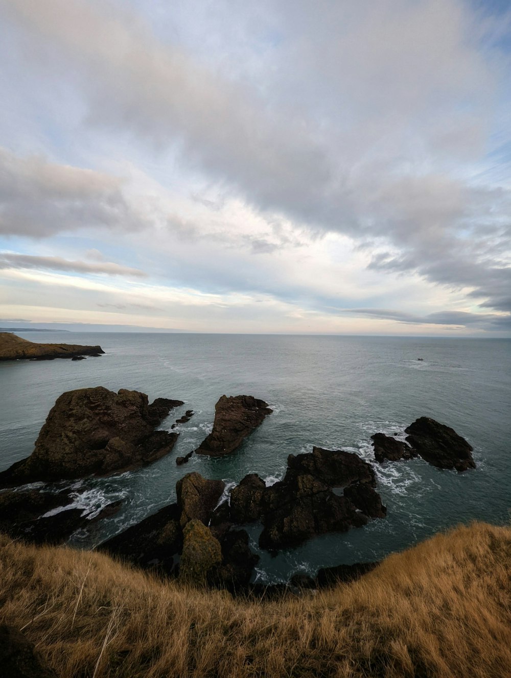 a view of a body of water from a hill