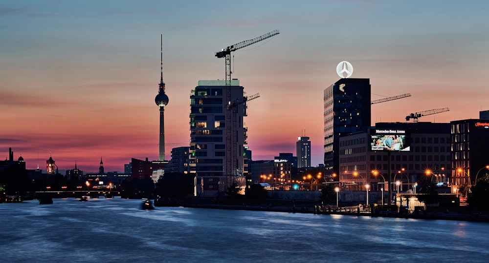 a view of a city at night from a river