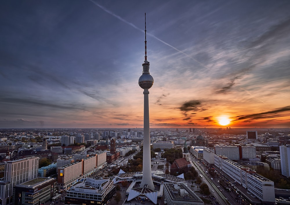 a very tall tower towering over a city