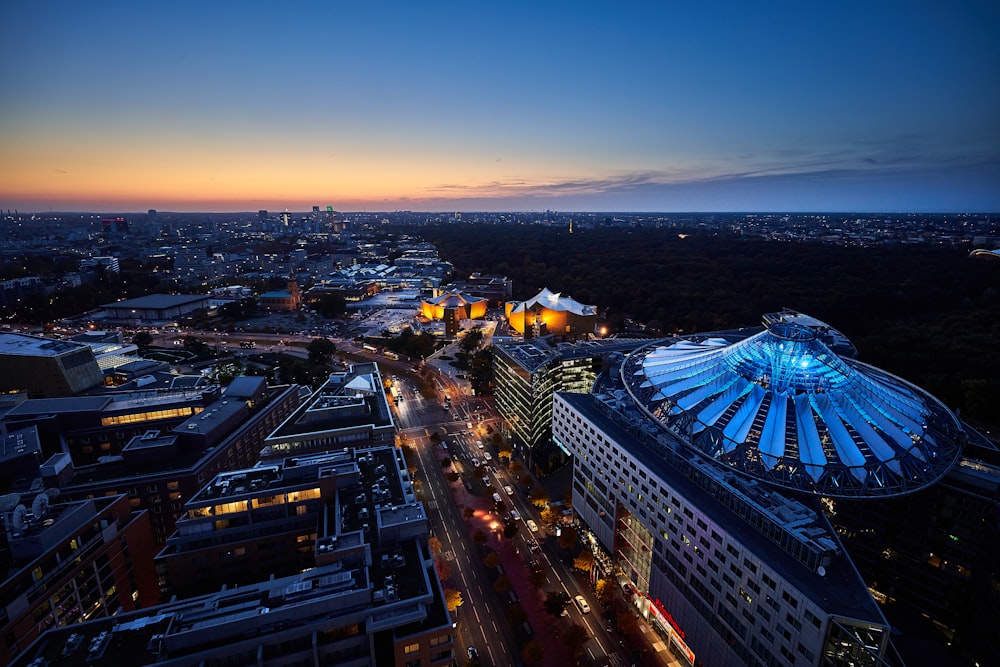 an aerial view of a city at night