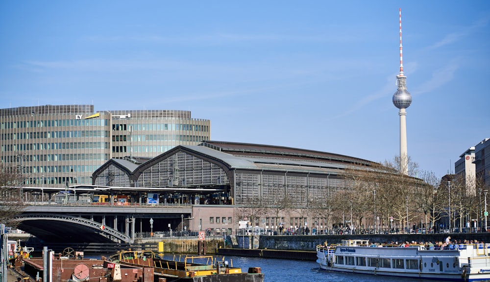 a large building with a tower in the background