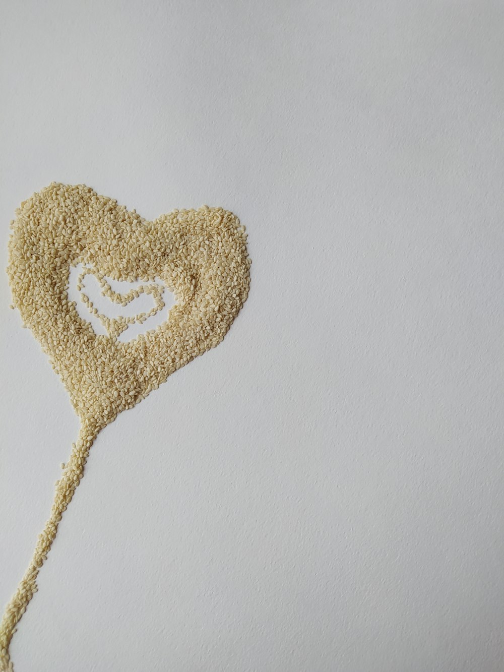 a picture of a heart made out of grains