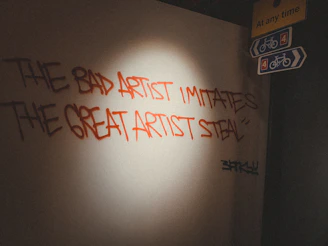 a wall that has some writing on it