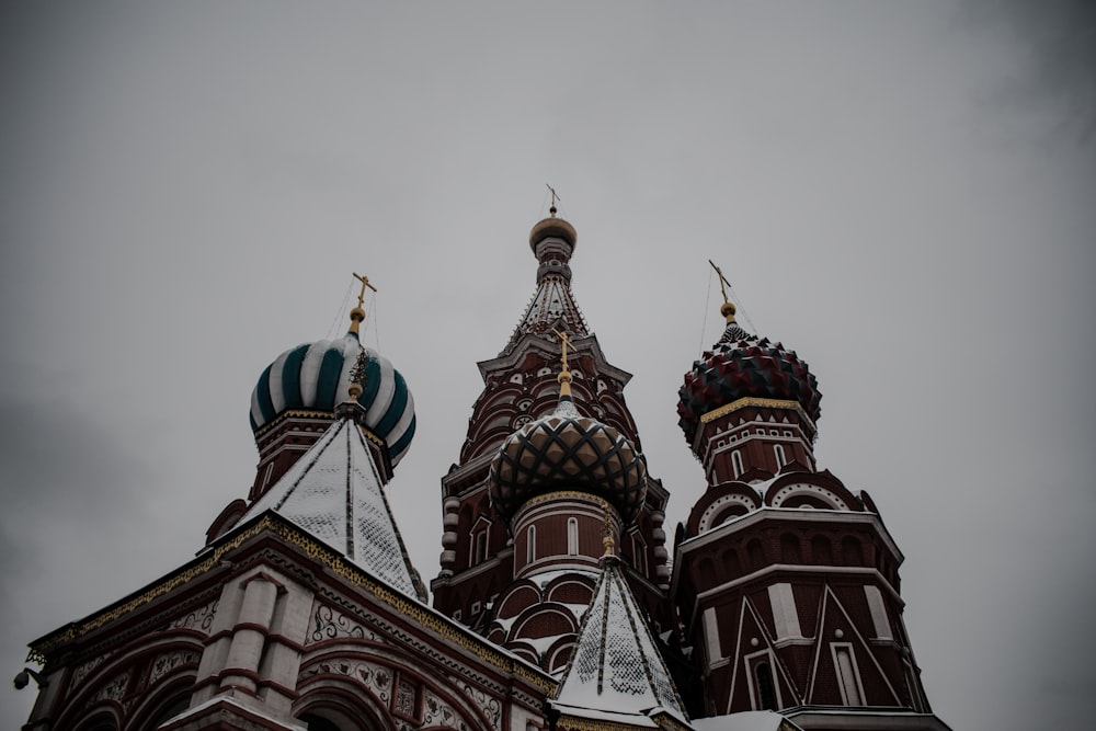 a very tall building with two domes on top of it