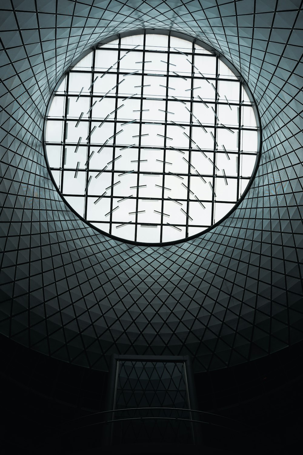 a circular window in the ceiling of a building