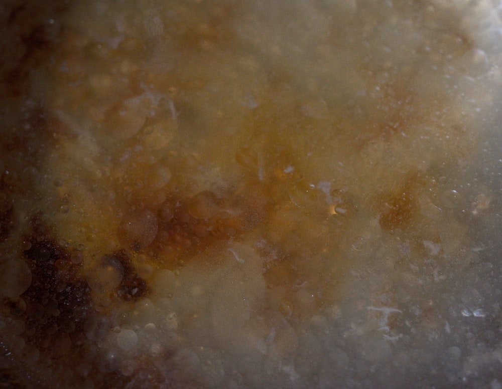 a close up view of food cooking in a pan