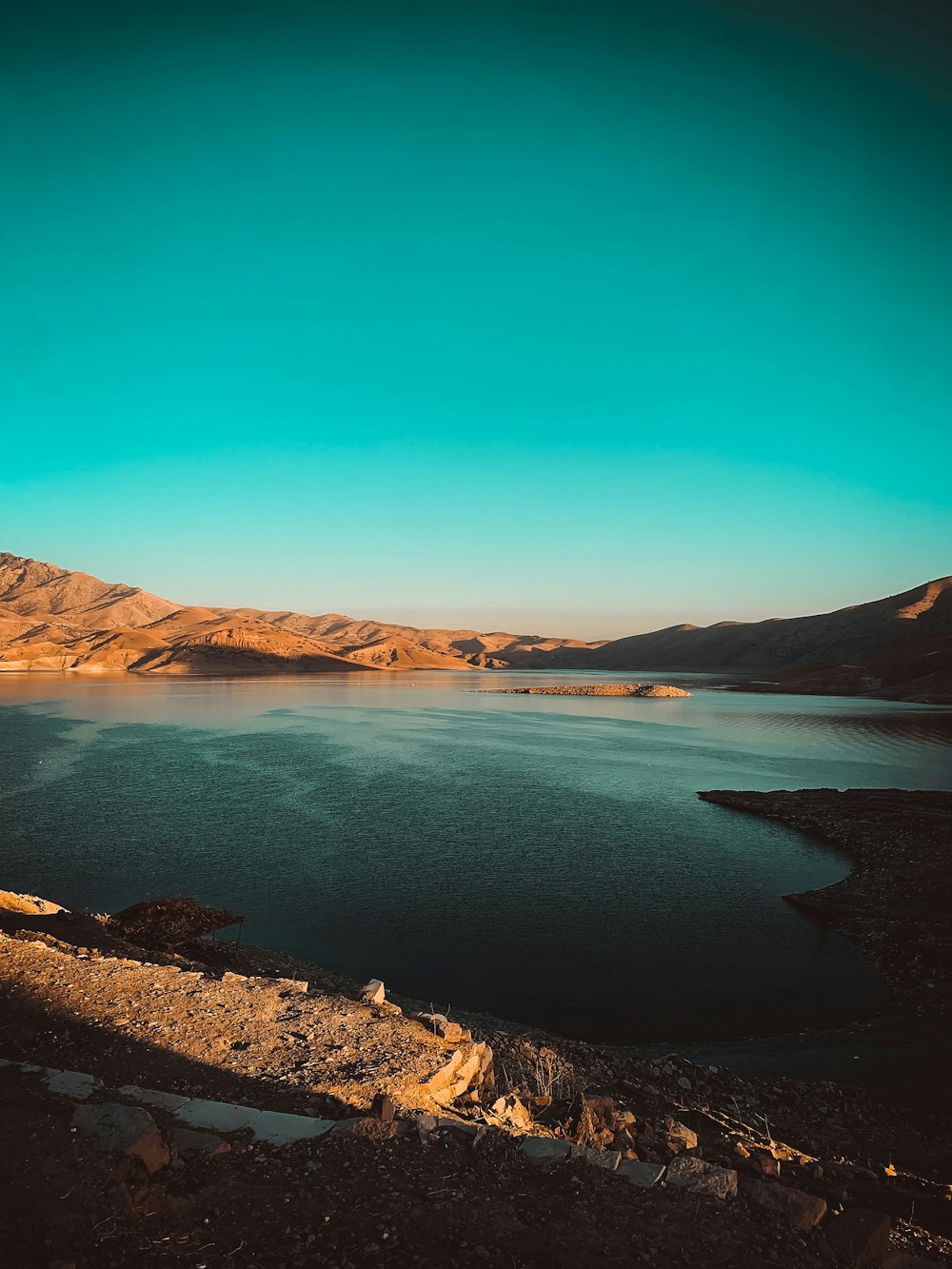 a large body of water surrounded by mountains