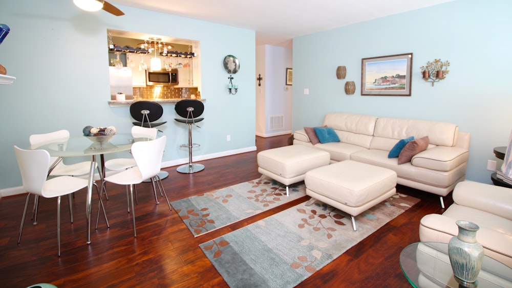 a living room filled with furniture and a flat screen tv